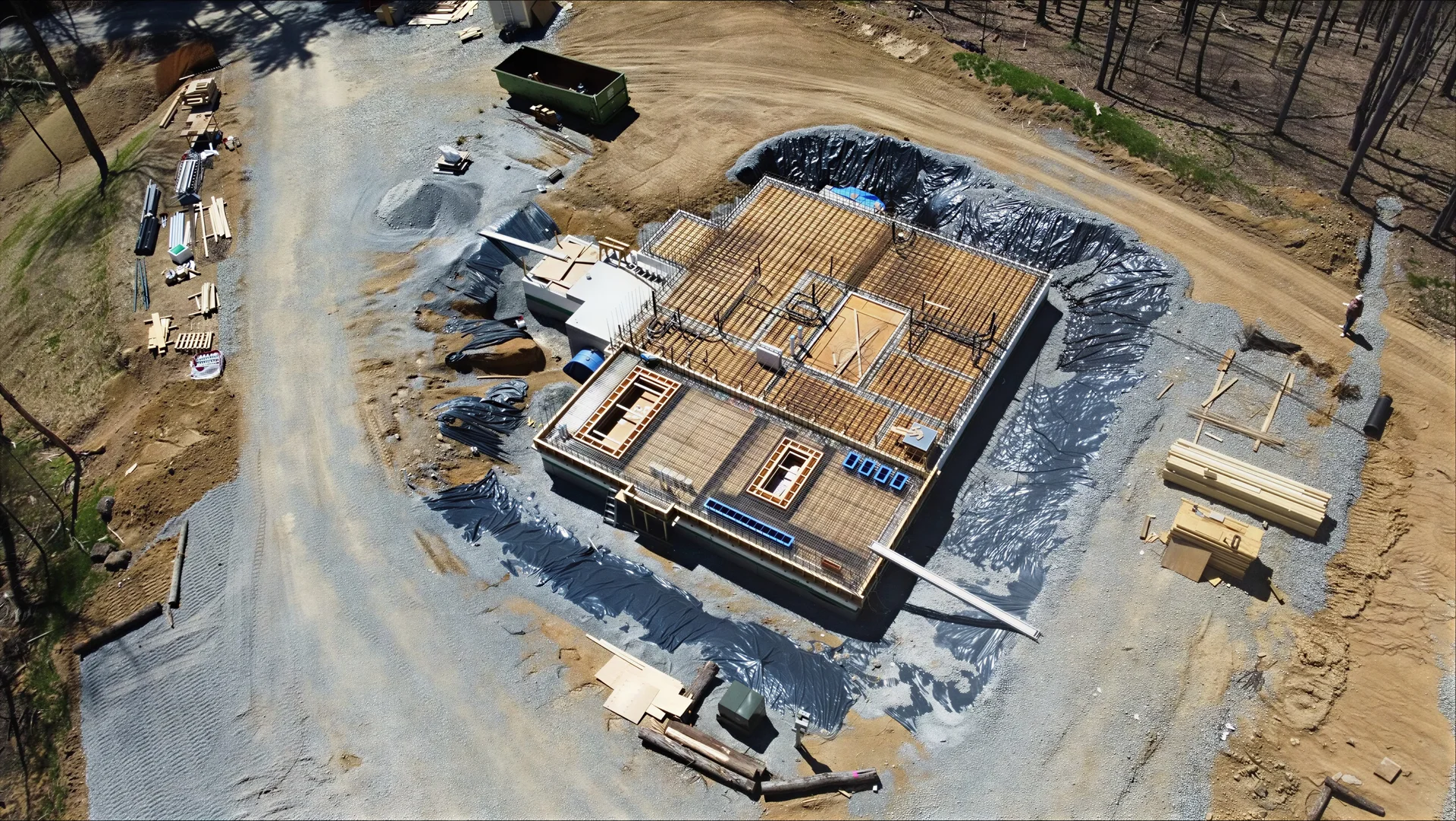 Reinforced concrete bunker foundation and excavation